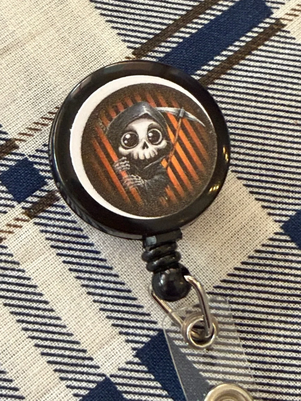 Cute Grim Reaper Badge Reel - Black & Orange